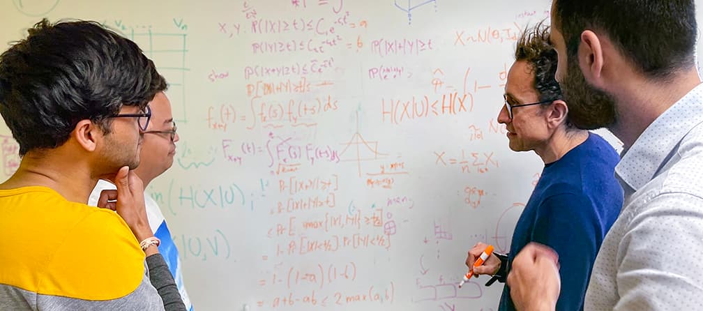 Granica research, at a whiteboard
